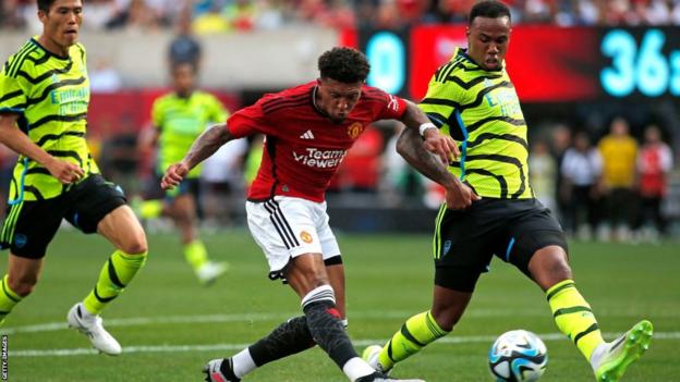 Jadon Sancho scores for Manchester United against Arsenal at the MetLife Stadium
