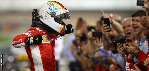 Ferrari F1 driver Sebastian Vettel celebrates winning the 2018 Bahrain Grand Prix