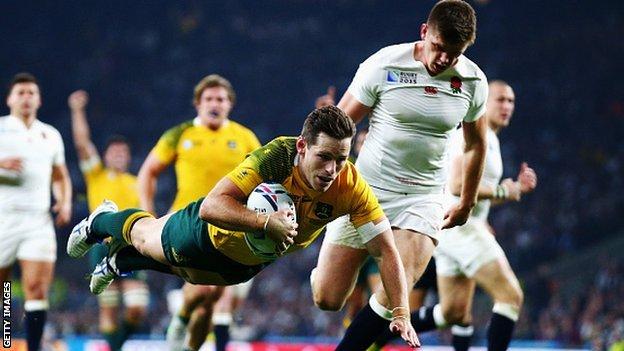 Bernard Foley scores a try for Australia against England at the 2015 Rugby World Cup