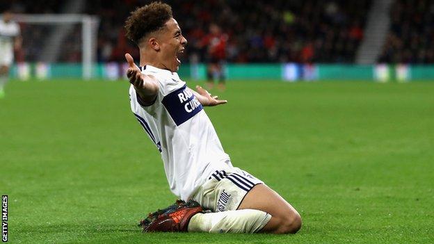 Middlesbrough's Marcus Tavernier celebrates a goal by sliding on his knees