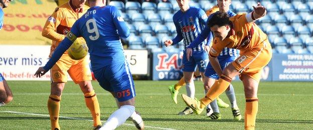 Carl McHugh smashes the ball high into the net to draw Motherwell level at Rugby Park