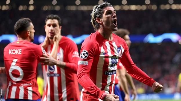 Rodrigo de Paul celebrates after opening the scoring for Atletico Madrid in Champions League quarter-final against Borussia Dortmund
