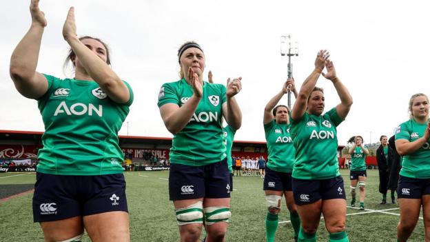 Ireland players applaud their fans after the defeat by England in Cork