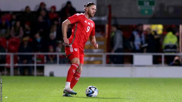 Wes Burns in action for Wales