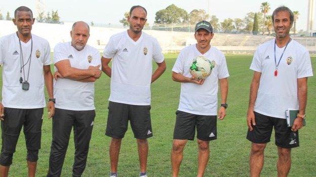 Former Libya coach Jalal Damja (far right) with his coaching team