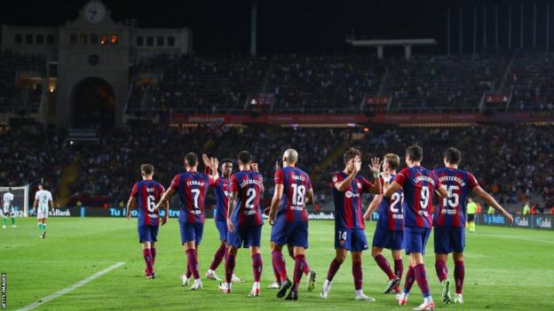 Barcelona celebrate after scoring against Real Betis