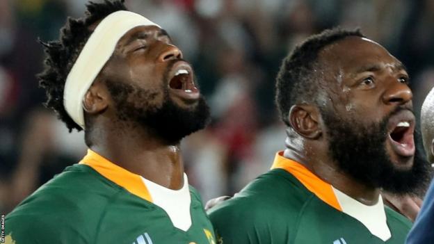 Siya Kolisi (left) and Tendai Mtawarira (right) playing for South Africa in the 2019 Rugby World Cup final