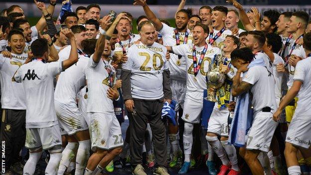 Leeds United and Marcelo Bielsa celebrate winning the Championship title