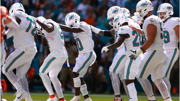 The Miami Dolphins dancing after scoring a touchdown