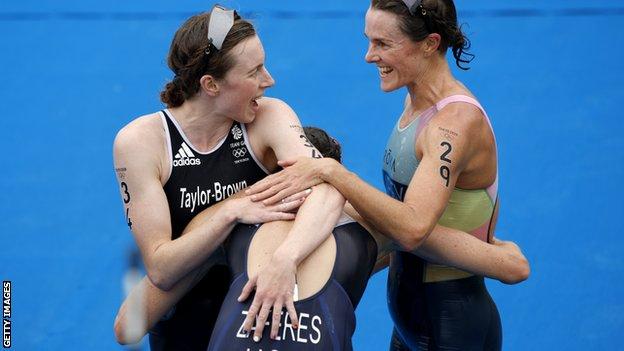 Georgia Taylor-Brown, Katie Zaferes and Flora Duffy celebrate the triathlon