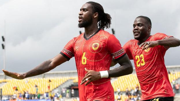 Angola's Felicio Mendes Joao Milson celebrates his goal with team-mates after scoring against Central African Republic in Douala in June 2023