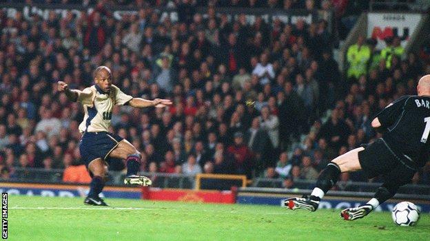 Sylvain Wiltord scores the winner against Manchester United at Old Trafford in 2002 that secured the Premier League title for Arsenal