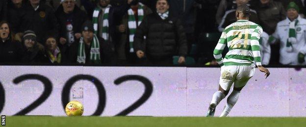 Olivier Ntcham rolls home Celtic's third goal against Aberdeen