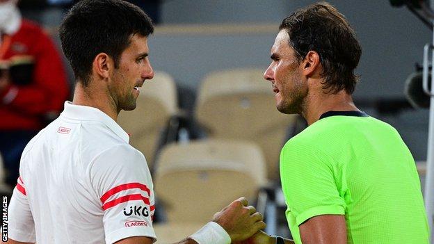 Novak Djokovic and Rafael Nadal shake hands after their epic French Open semi-final