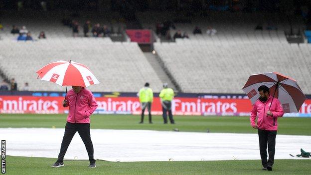Umpires inspect outfield at MCG