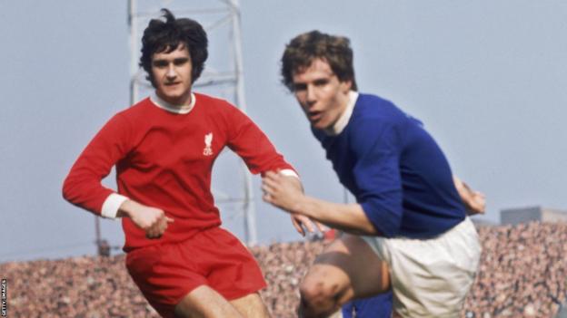 Liverpool defender Larry Lloyd (left) and Everton centre-forward Joe Royle in action during an FA Cup semi-final