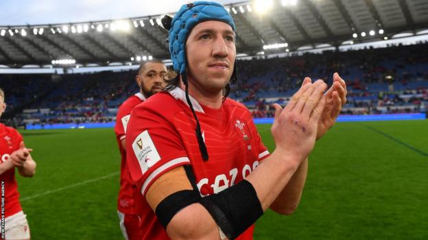 Wales flanker Justin Tipuric claps the travelling supporters after the 29-17 Six Nations win against Italy in Rome