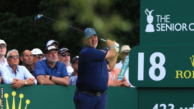 Darren Clarke tees off at the final hole in Thursday's first round