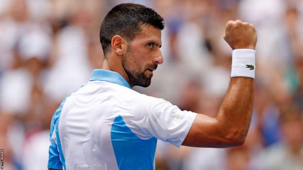 Novak Djokovic celebrates winning a point