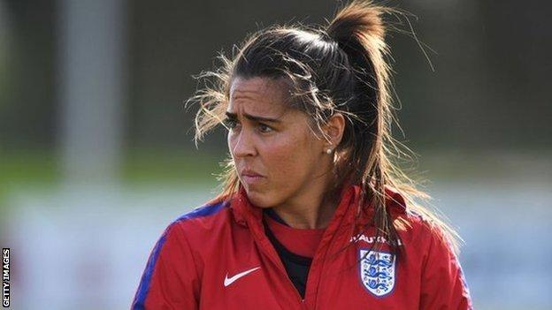 Fara Williams looks on during an England Women's training session at St Georges Park.