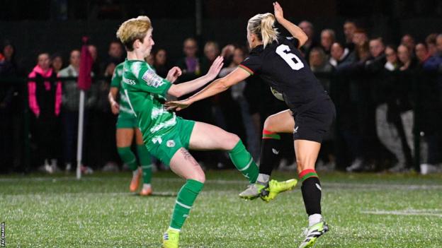 Nadene Caldwell is caught by Kirsty McGuinness
