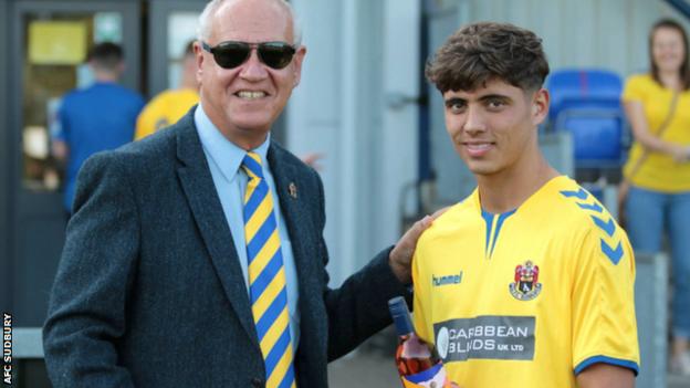 Shane Temple with AFC Sudbury chairman Andrew Long after scoring four goals in the FA Cup preliminary round