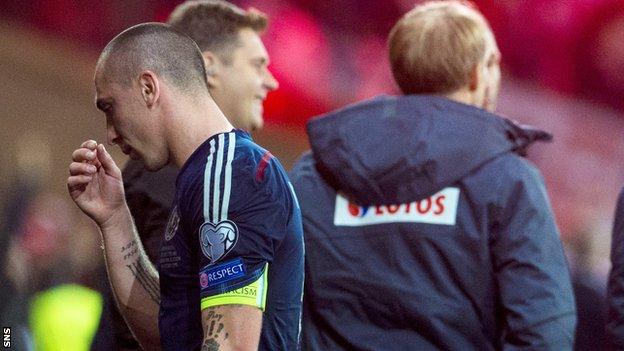 Scotland's Scott Brown shows his disappointment against Poland