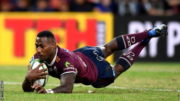 Suliasi Vunivalu of the Queensland Reds scores a try
