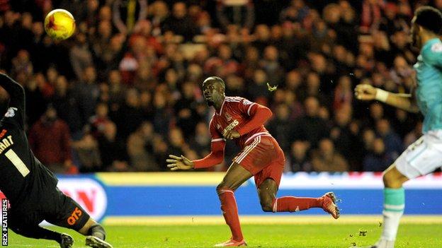 Albert Adomah puts Middlesbrough ahead against Derby at the Riverside