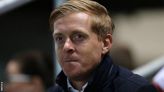 Garry Monk watches on from the sidelines