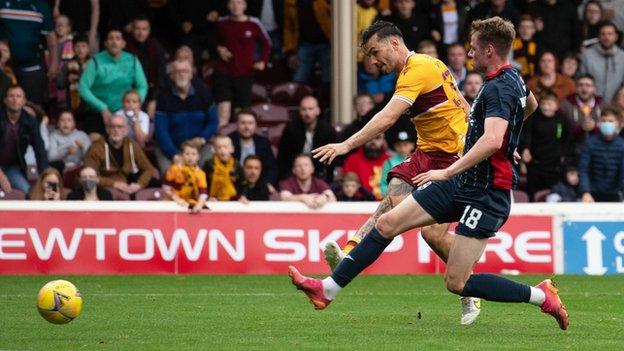 Tony Watt cracked in the winner to move Motherwell up to third