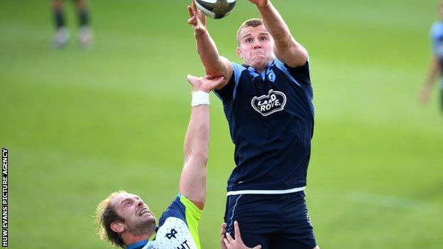 Shane Lewis-Hughes (right) beats Alun Wyn Jones to a line-out ball