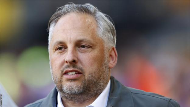 Wolves sporting director Matt Hobbs watches a Premier League match pitchside