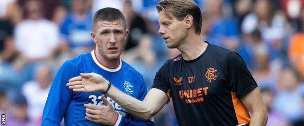 Rangers' John Lundstram and assistant manager Dave Vos