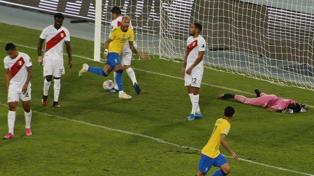 Lucas Paqueta (r) of Brazil celebrates with teammates Neymar