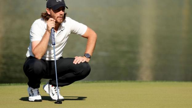 England's Tommy Fleetwood lining up   a putt astatine  Quail Hollow