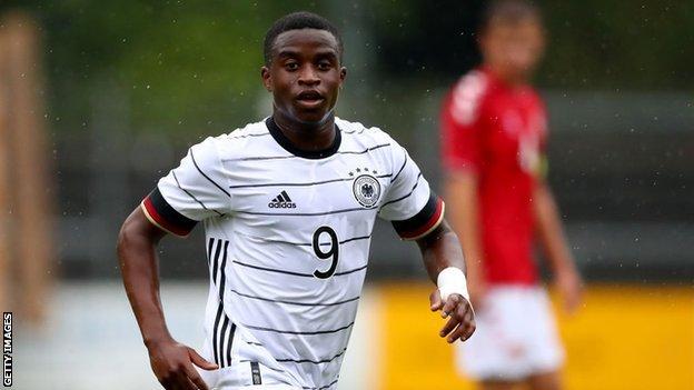 Youssoufa Moukoko in action for Germany under-20s