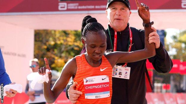 Kenya's Ruth Chepngetich crosses the finish line