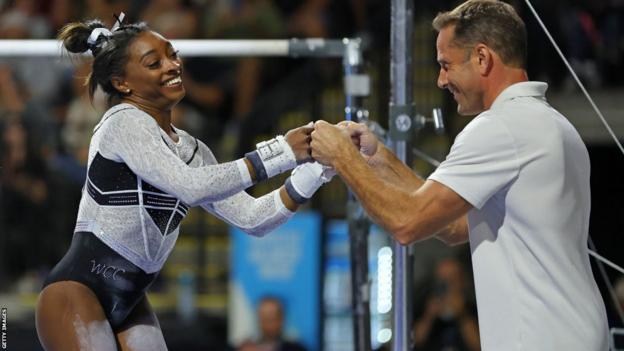 Biles was all smiles as she was cheered on by a sellout crowd