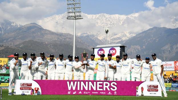 India celebrate with the trophy after beating England 4-1 in their Test series