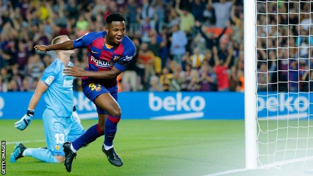 Ansu Fati celebrates scoring against Valencia
