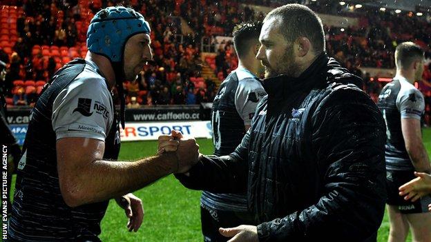 Opposing captains Justin Tipuric and Ken Owens shake hands after Scarlets 44-0 win over Ospreys
