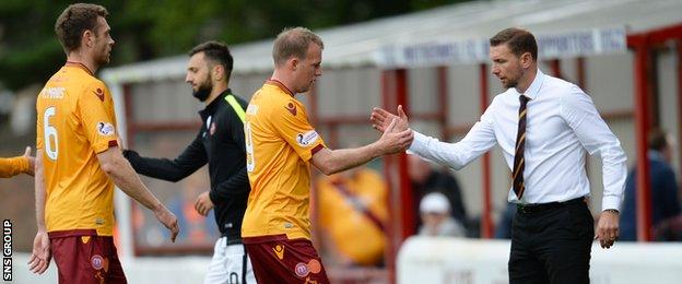 Motherwell players with their manager Ian Baraclough