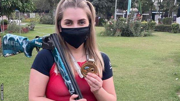 Amber Hill with her skeet World Cup gold medal