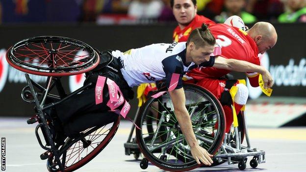 England's Jack Brown tackles Spain's Yannick Martin