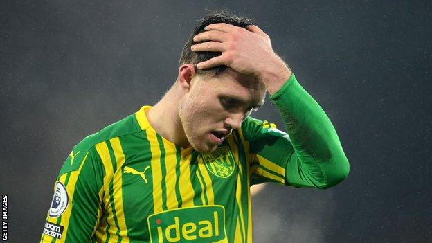 West Brom defender Dara O'Shea looks despondent