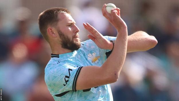 Surrey bowler Gus Atkinson