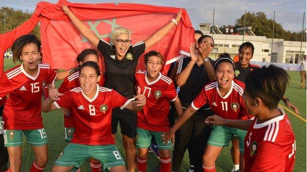 Morocco coach Lamiaa Boumedhi and her team celebrate winning the 2019 Women's Under-20 North African Championship