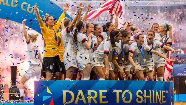 The United States celebrate with the trophy