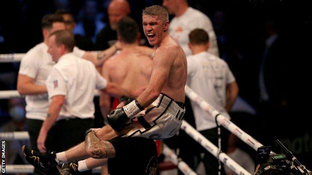 Liam Smith celebrates on the shoulders of a team member